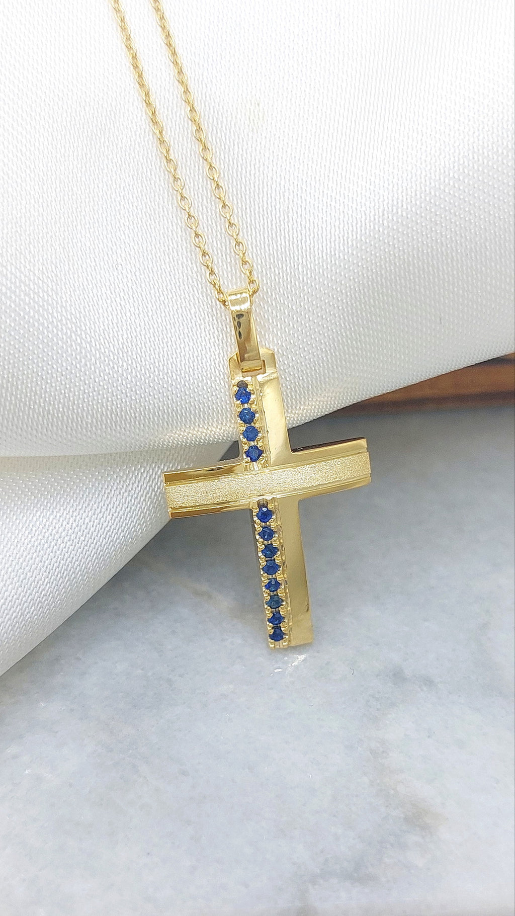Solid Gold cross with Sapphires