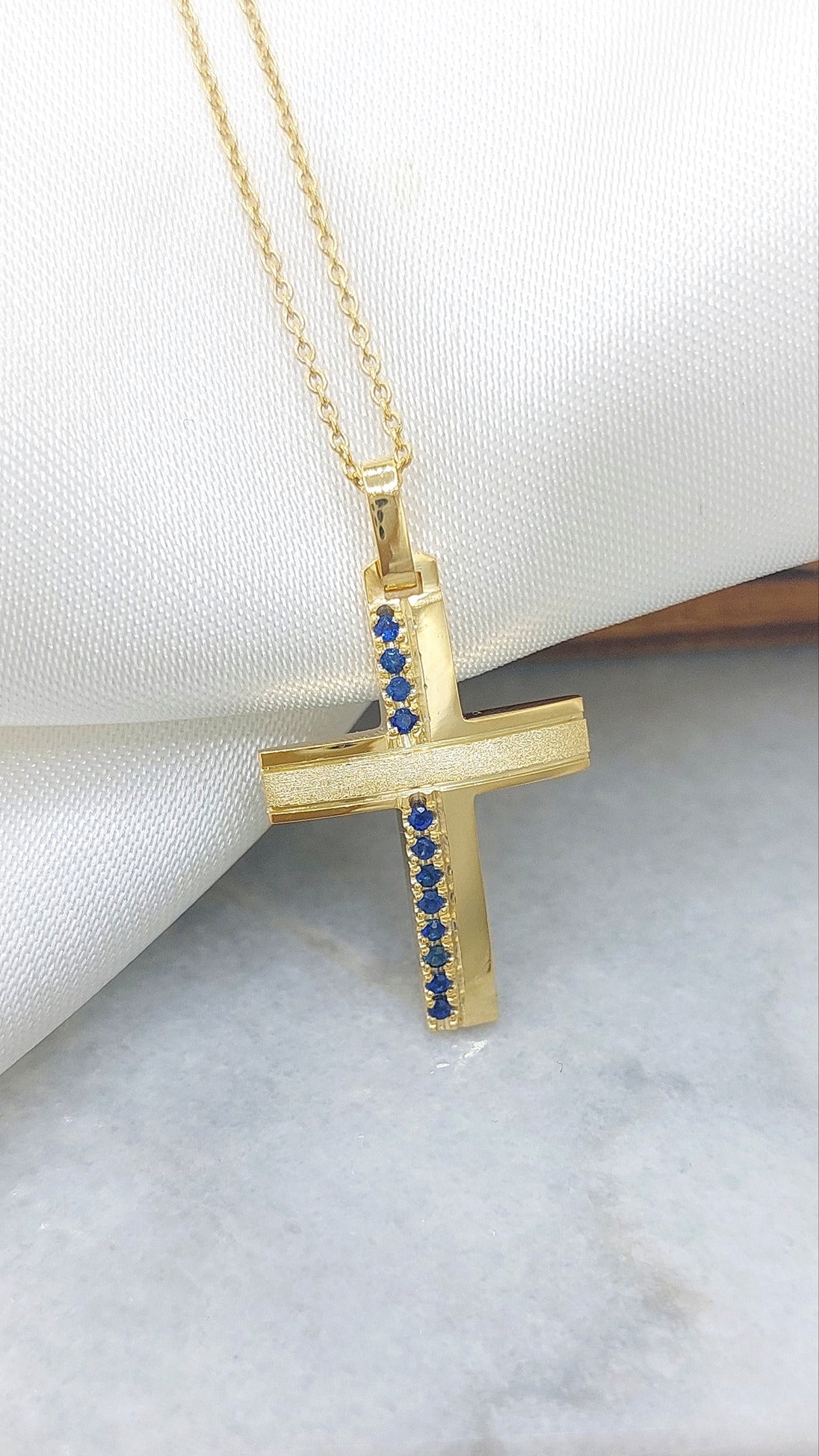 Solid Gold cross with Sapphires