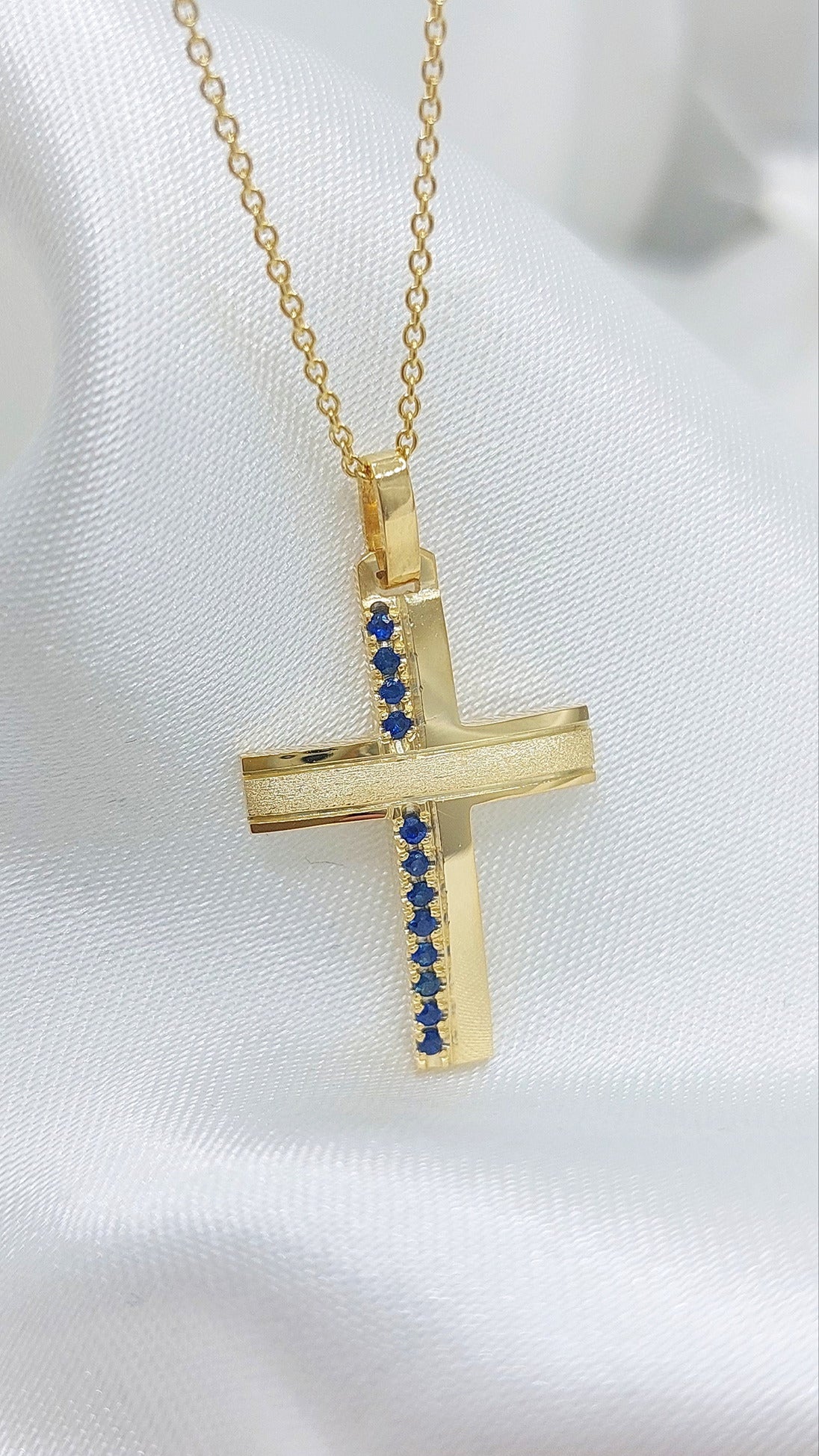 Solid Gold cross with Sapphires