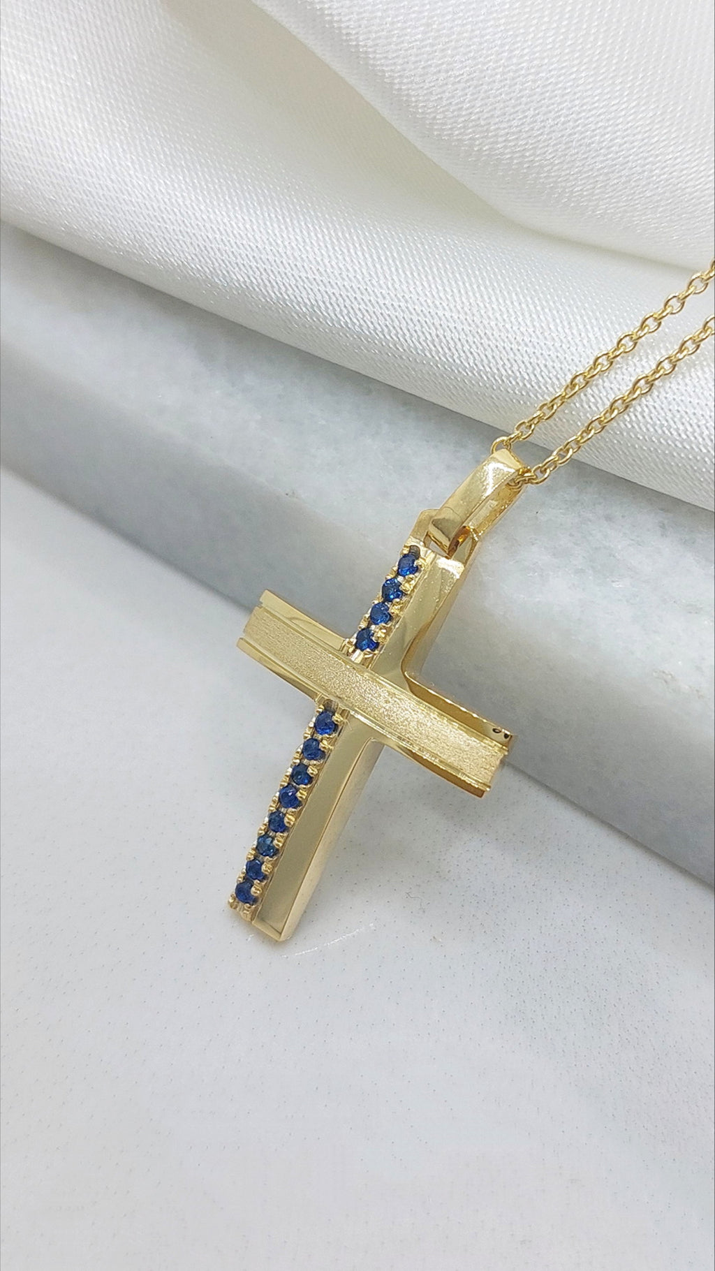Solid Gold cross with Sapphires